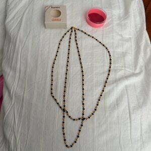 Black and Gold Beaded Necklace from BAPS Shri Swaminarayan Mandir